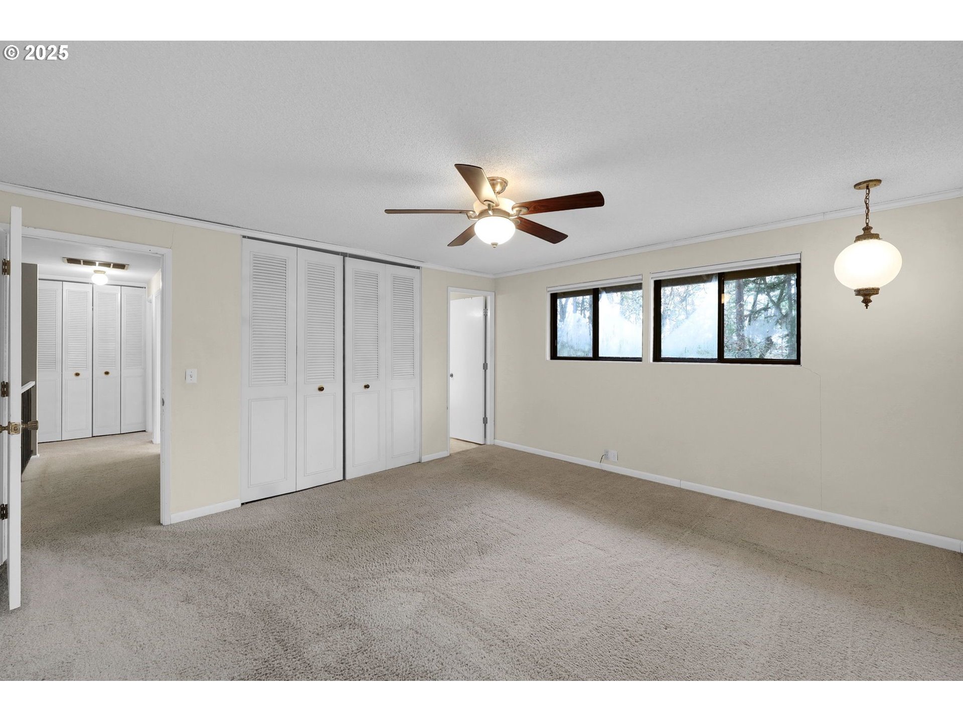 4103 Brae Burn Drive Eugene, OR 97405 - Photo 17 of 22 a view of an empty room with a ceiling fan