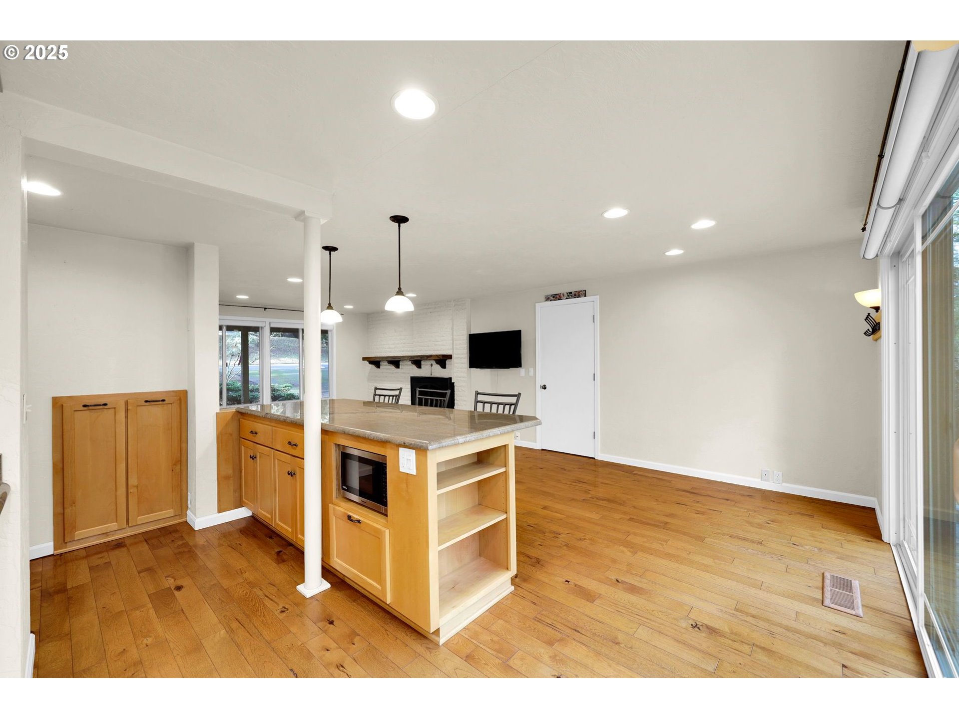 4103 Brae Burn Drive Eugene, OR 97405 - Photo 9 of 22 a kitchen with stainless steel appliances a stove top oven and a refrigerator