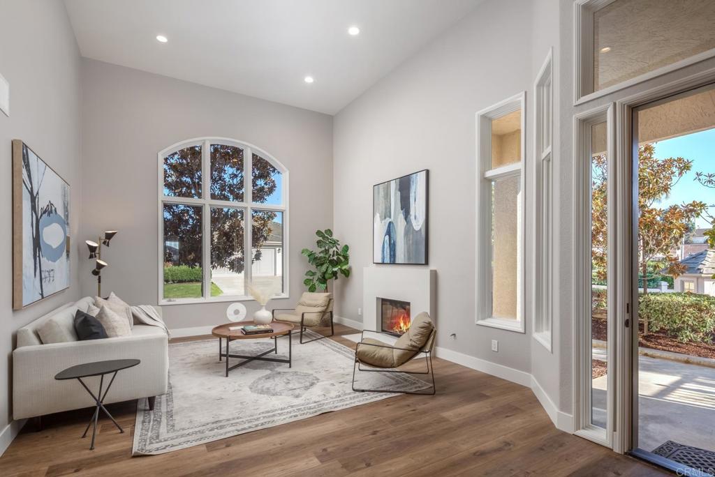 1808 Amalfi Drive Encinitas, CA 92024 - Photo 13 of 33 a living room with furniture and a large window