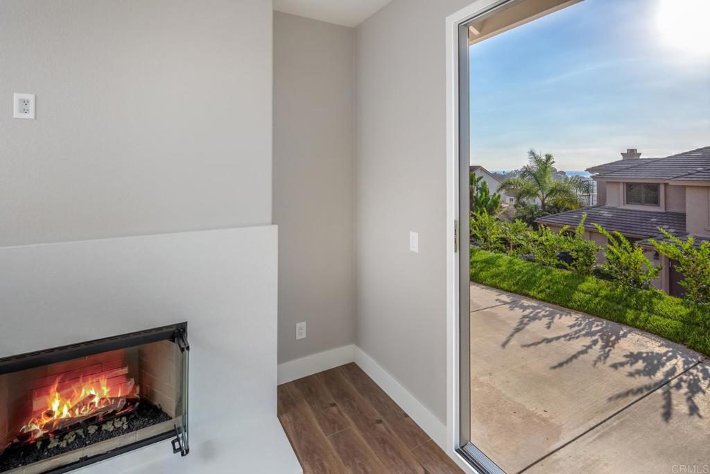 1808 Amalfi Drive Encinitas, CA 92024 - Photo 18 of 33 a view of an empty room with a kitchen