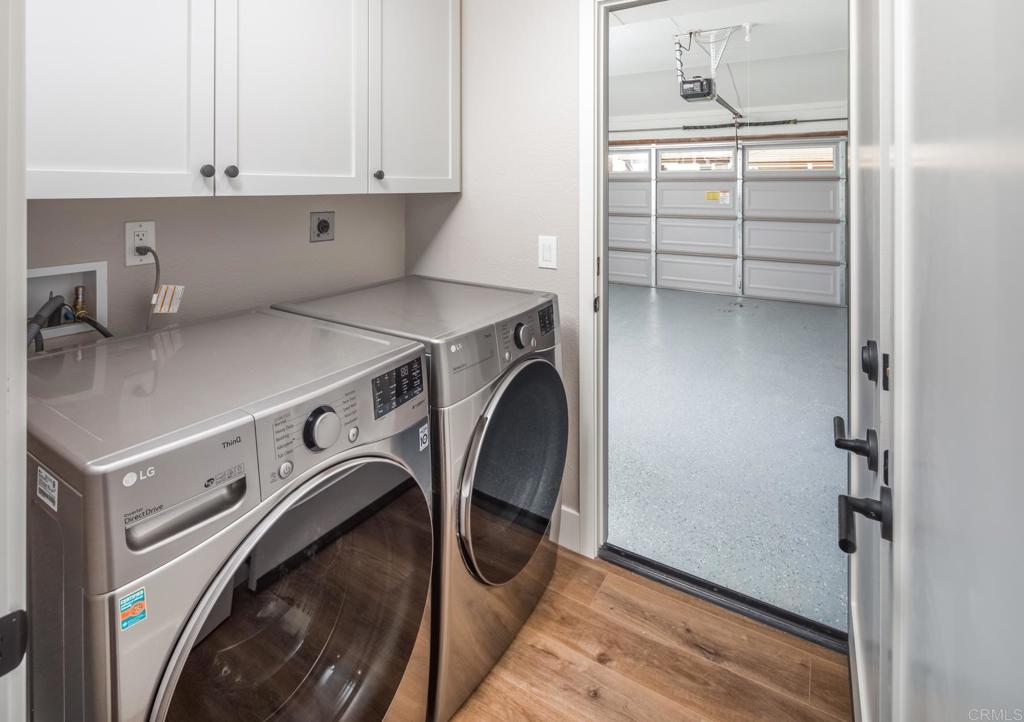 1808 Amalfi Drive Encinitas, CA 92024 - Photo 20 of 33 a utility room with dryer and washer