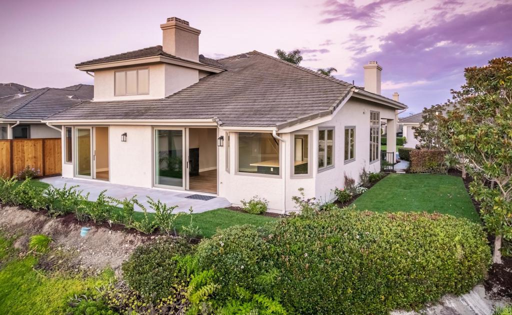1808 Amalfi Drive Encinitas, CA 92024 - Photo 31 of 33 a front view of a house with a yard