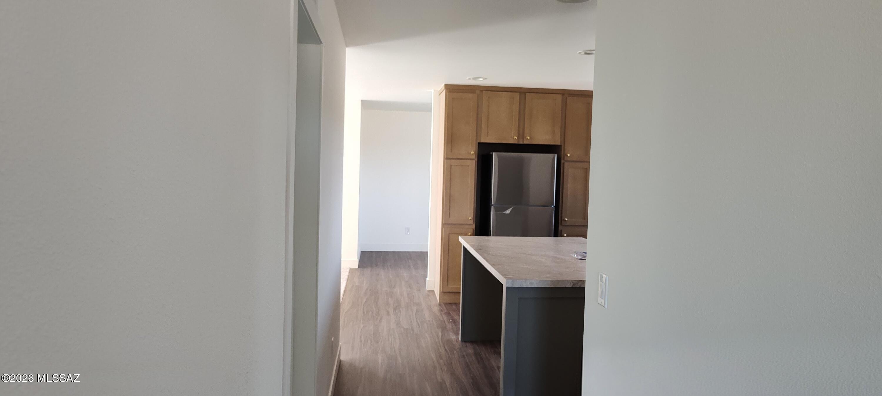 18565 West McClean Road Marana, AZ 85653 - Photo 13 of 37 a view of hallway with wooden floor