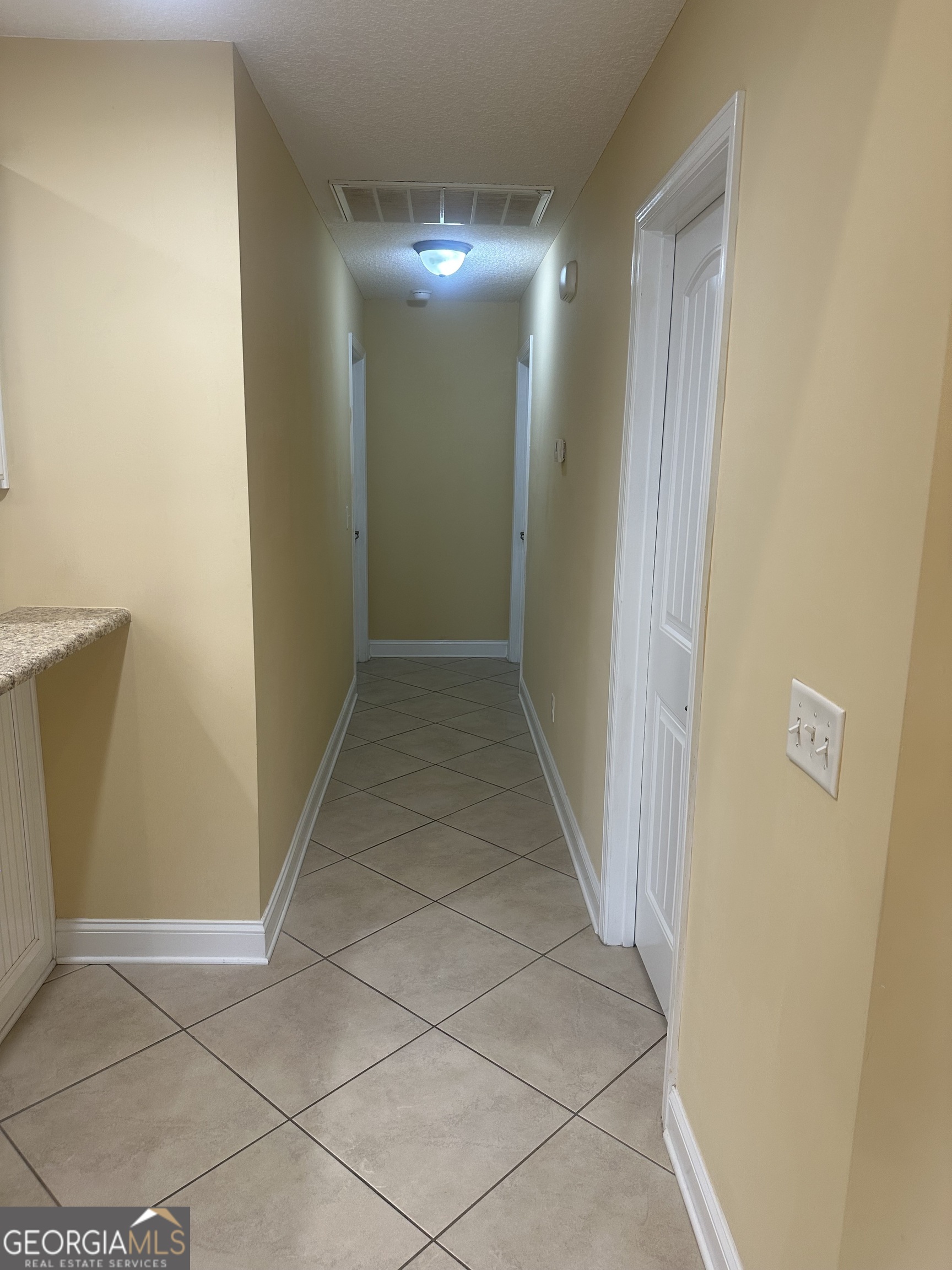 12 Fox Path St. Marys, GA 31558 - Photo 11 of 23 a view of a room with door