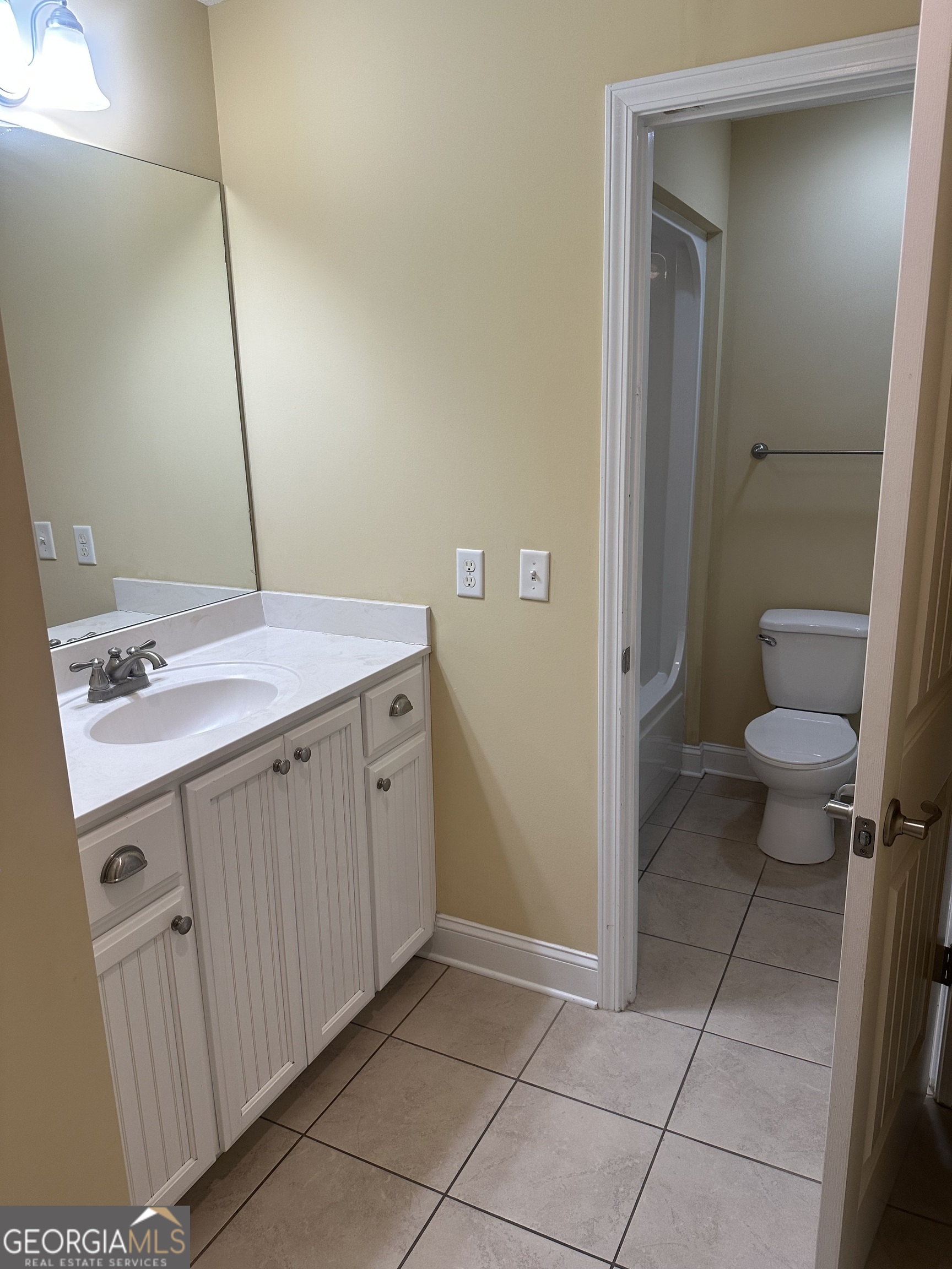 12 Fox Path St. Marys, GA 31558 - Photo 15 of 23 a bathroom with a sink a toilet and a mirror