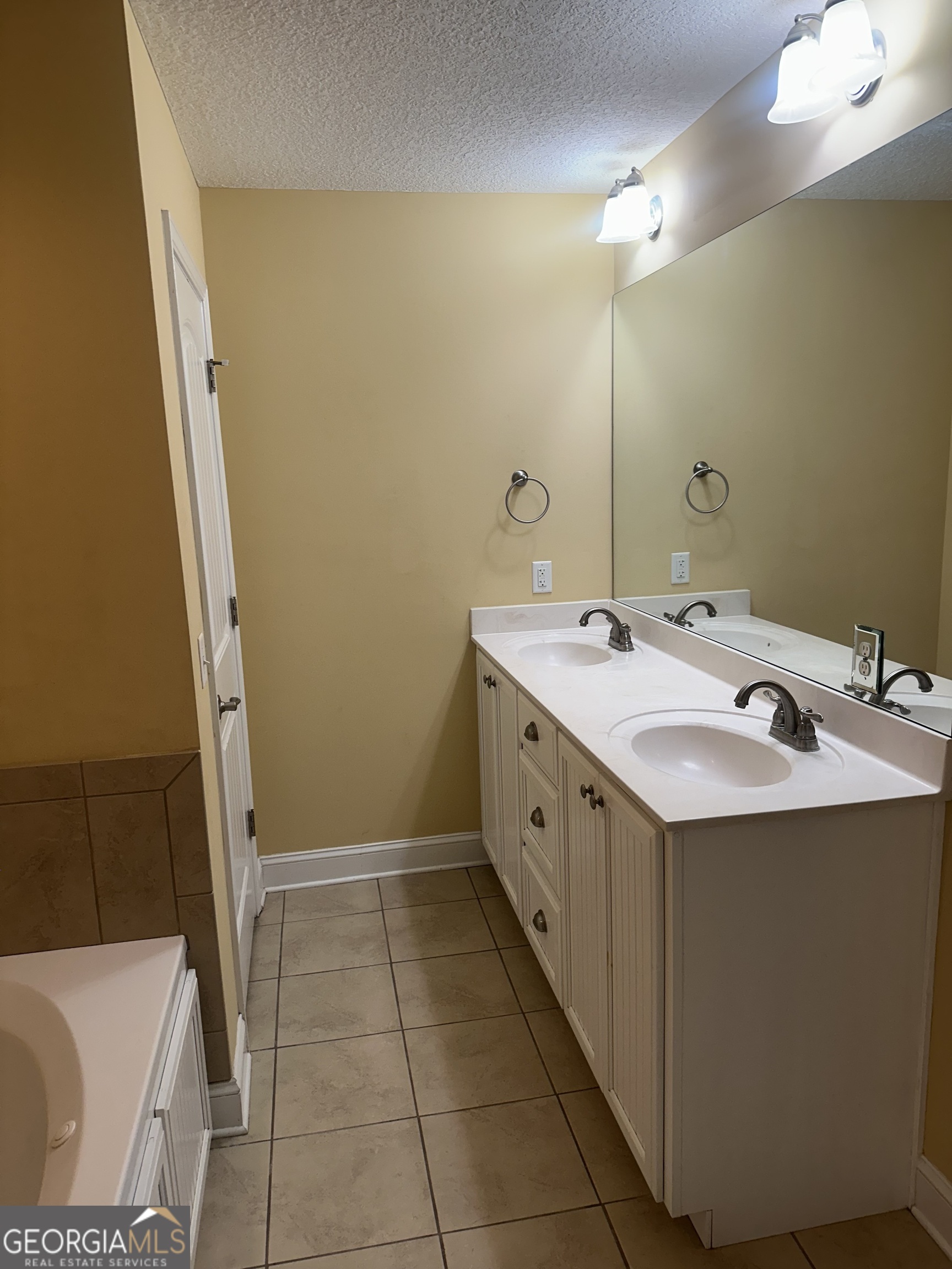 12 Fox Path St. Marys, GA 31558 - Photo 23 of 23 a bathroom with a sink a toilet and mirror
