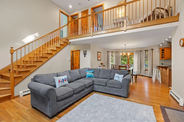 a living room with furniture or stairs and a couch