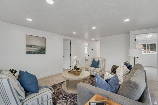 337 West 2900th Street South Bountiful, UT 84010 - Photo 22 of 35 Carpeted living room featuring baseboards and recessed lighting