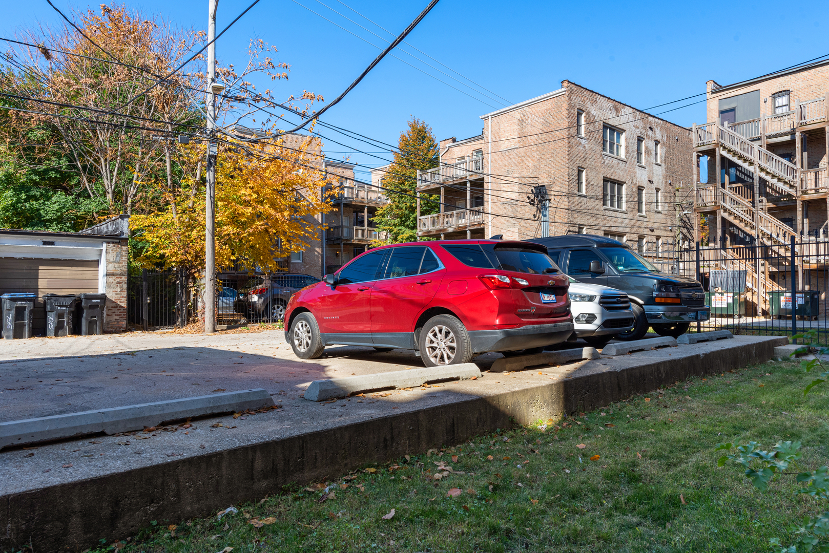 7010 South Clyde Avenue, Unit 3N Chicago, IL 60649 - Photo 18 of 19 a view of a street with cars