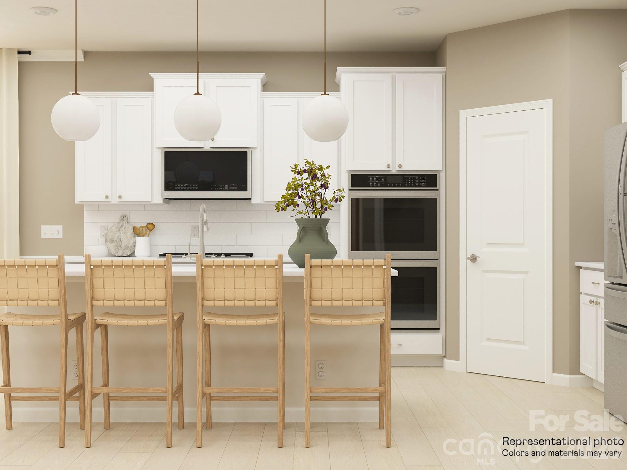 5451 Redbud Road, Unit 52 Lancaster, SC 29720 - Photo 1 of 22 a kitchen with stainless steel appliances granite countertop a stove a sink and a refrigerator