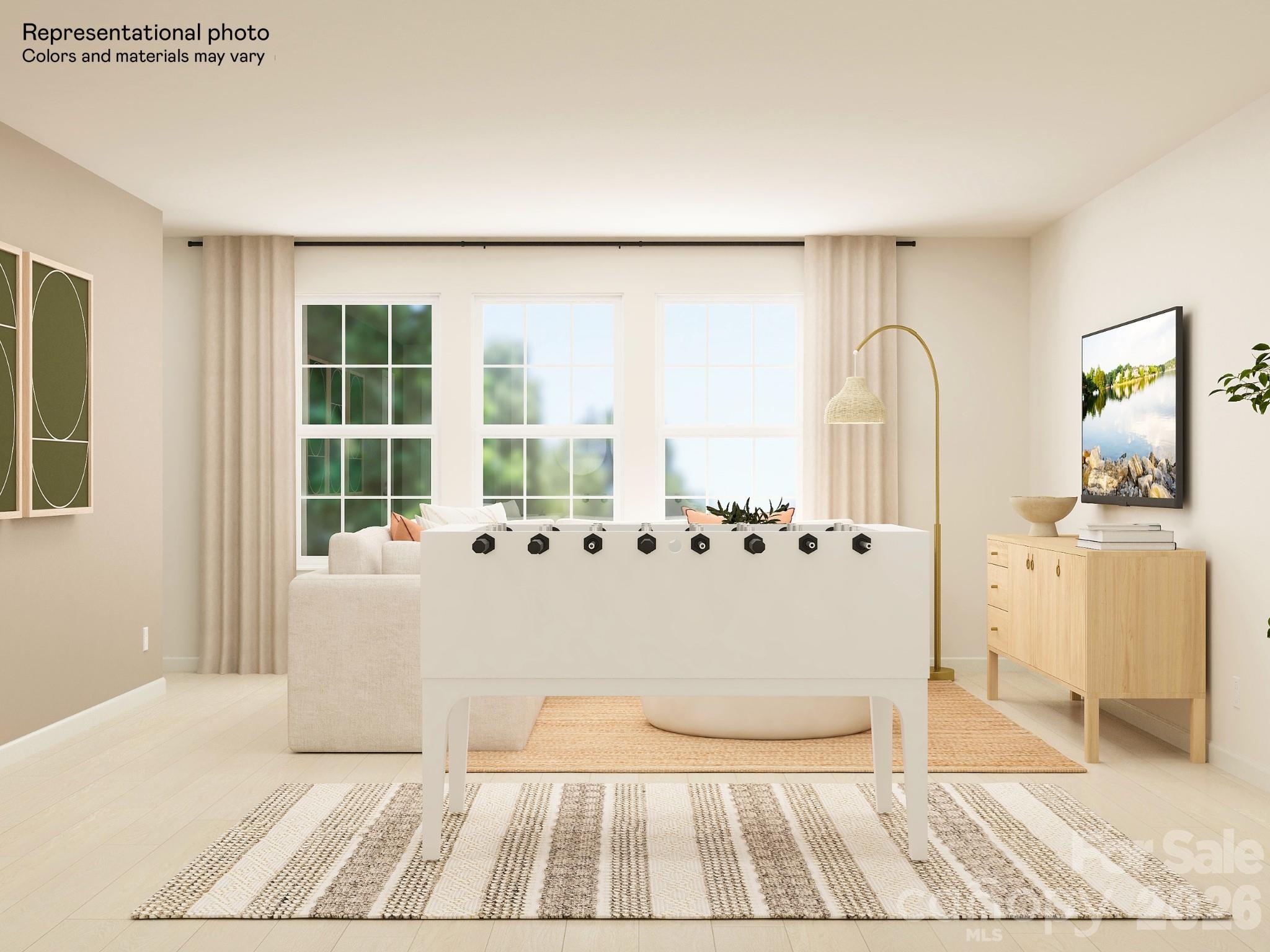 5451 Redbud Road, Unit 52 Lancaster, SC 29720 - Photo 14 of 22 a large white room with a large window and chandelier