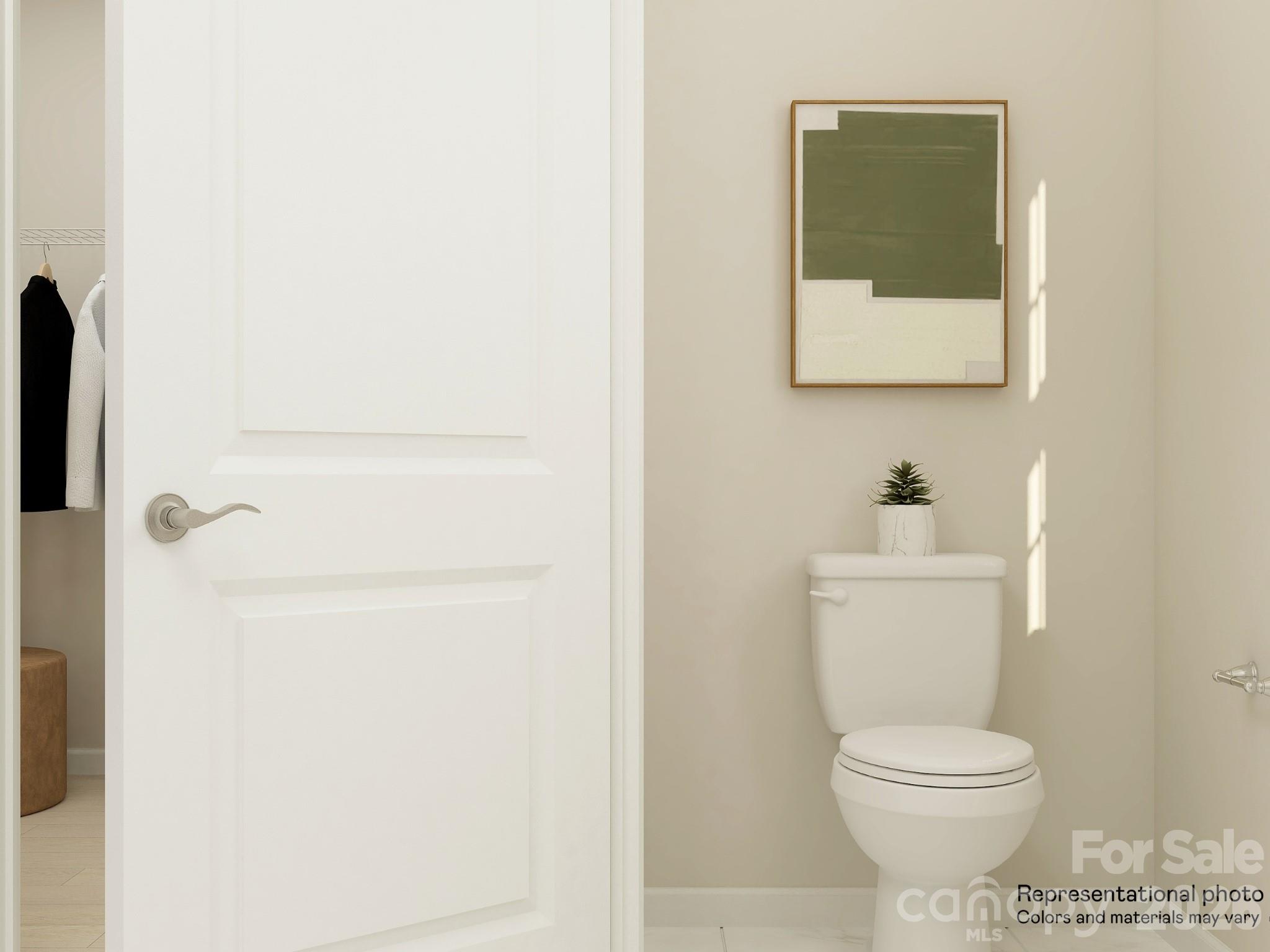 5451 Redbud Road, Unit 52 Lancaster, SC 29720 - Photo 20 of 22 a bathroom with a toilet and a sink