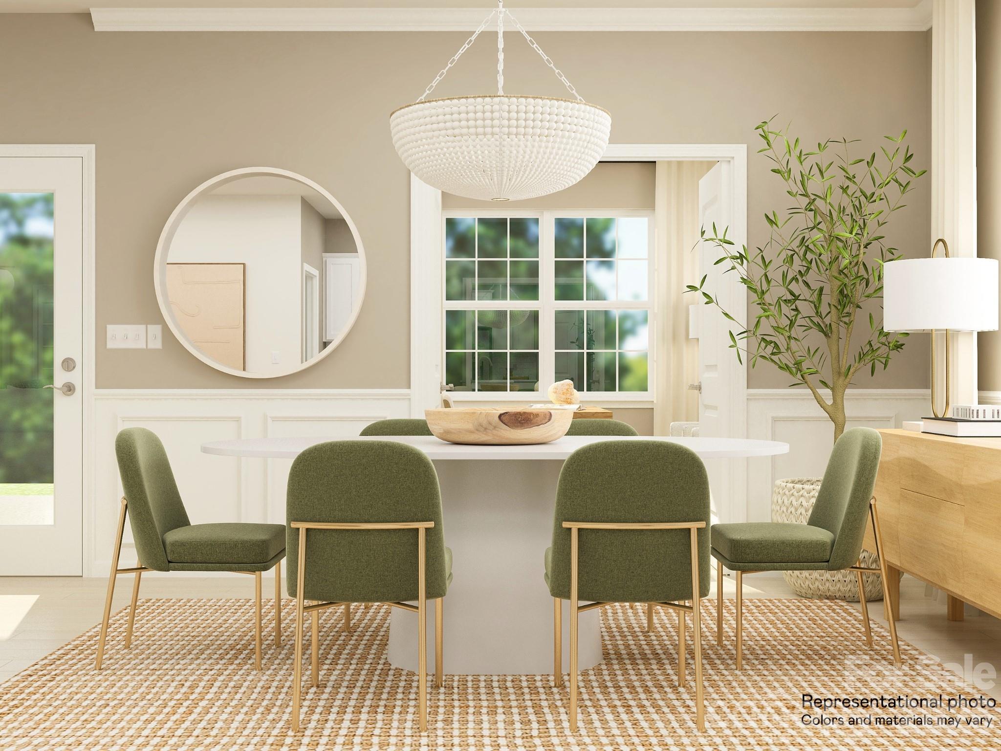 5451 Redbud Road, Unit 52 Lancaster, SC 29720 - Photo 5 of 22 a living room with couches a table and a potted plant