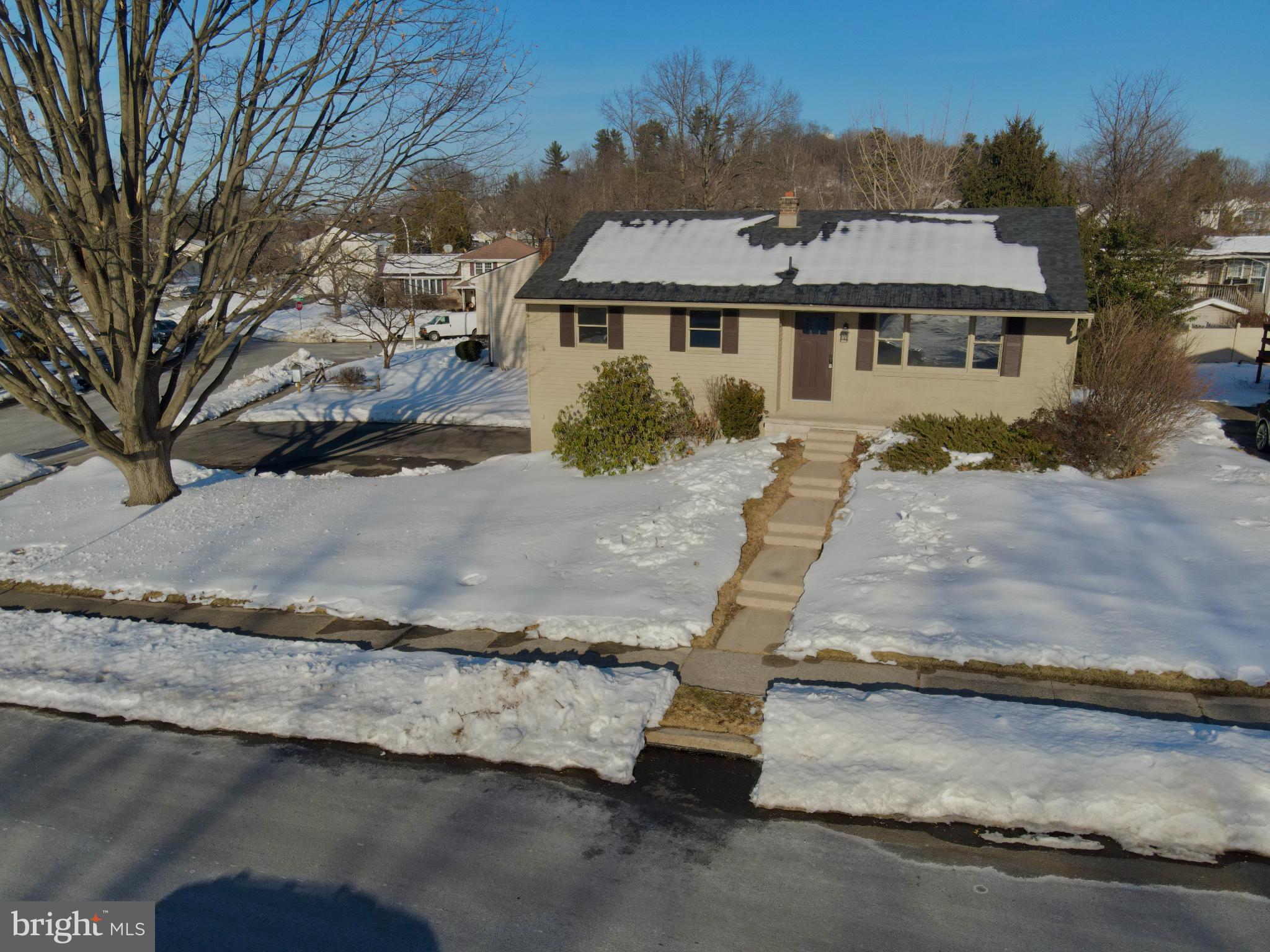 701 Tamarack Trail Reading, PA 19607 - Photo 14 of 32 Charming home nestled in a winter landscape.