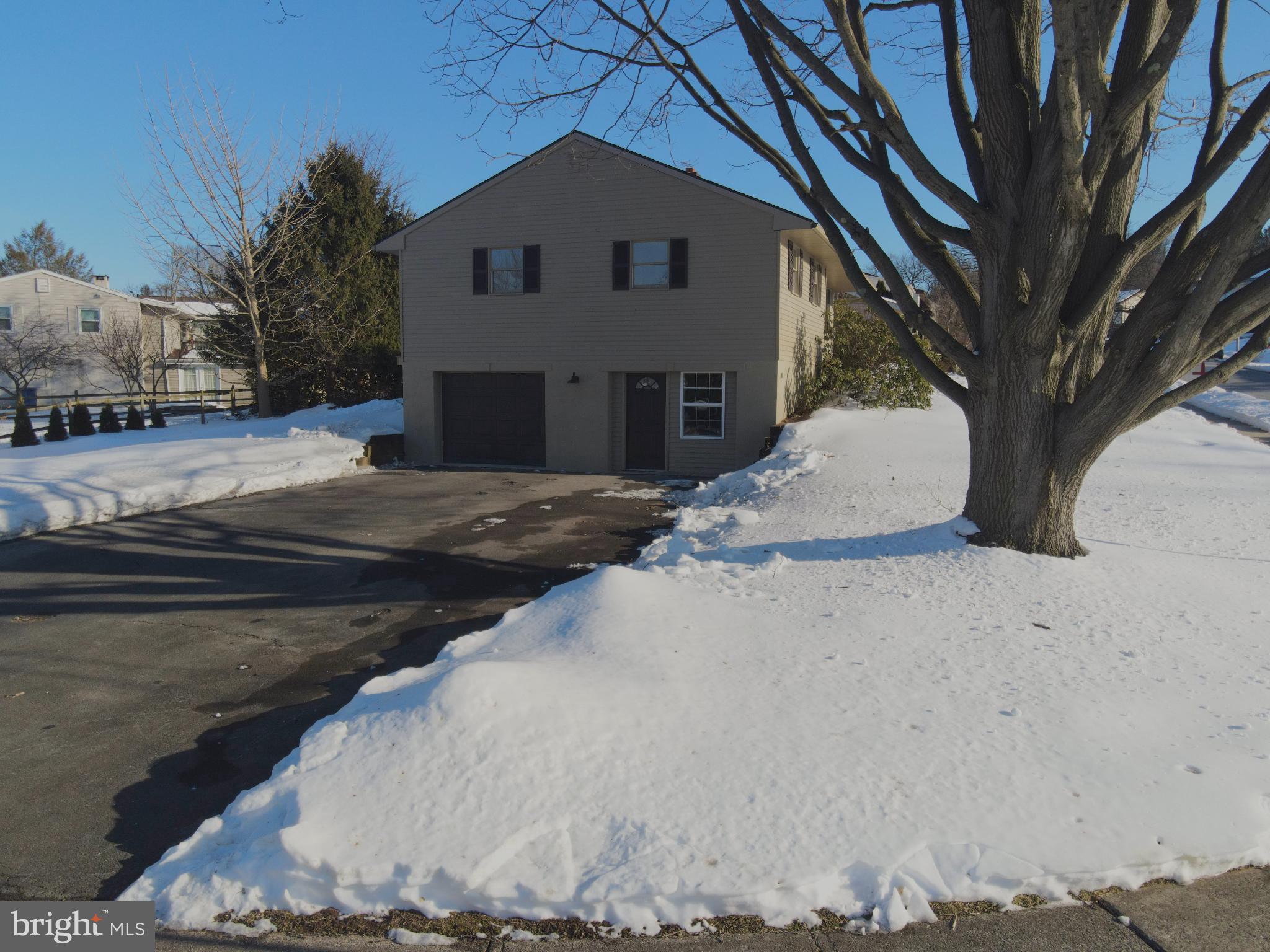 701 Tamarack Trail Reading, PA 19607 - Photo 17 of 32 Charming home nestled in a snowy landscape.