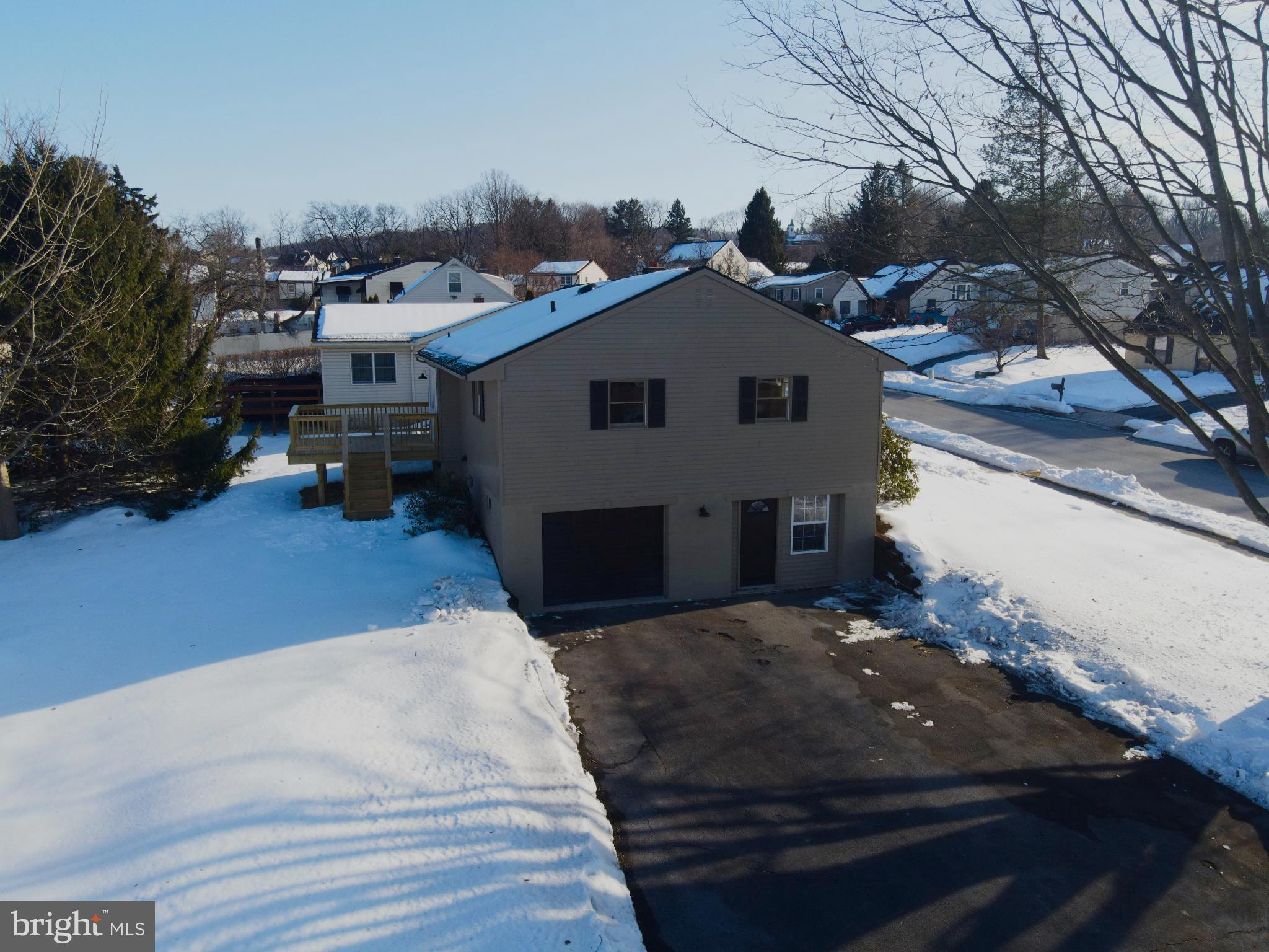 701 Tamarack Trail Reading, PA 19607 - Photo 18 of 32 Charming home nestled in a snowy landscape.