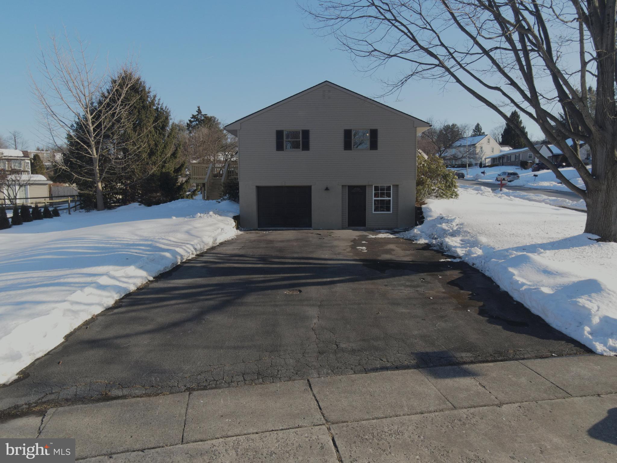 701 Tamarack Trail Reading, PA 19607 - Photo 19 of 32 Charming home nestled in a snowy landscape.