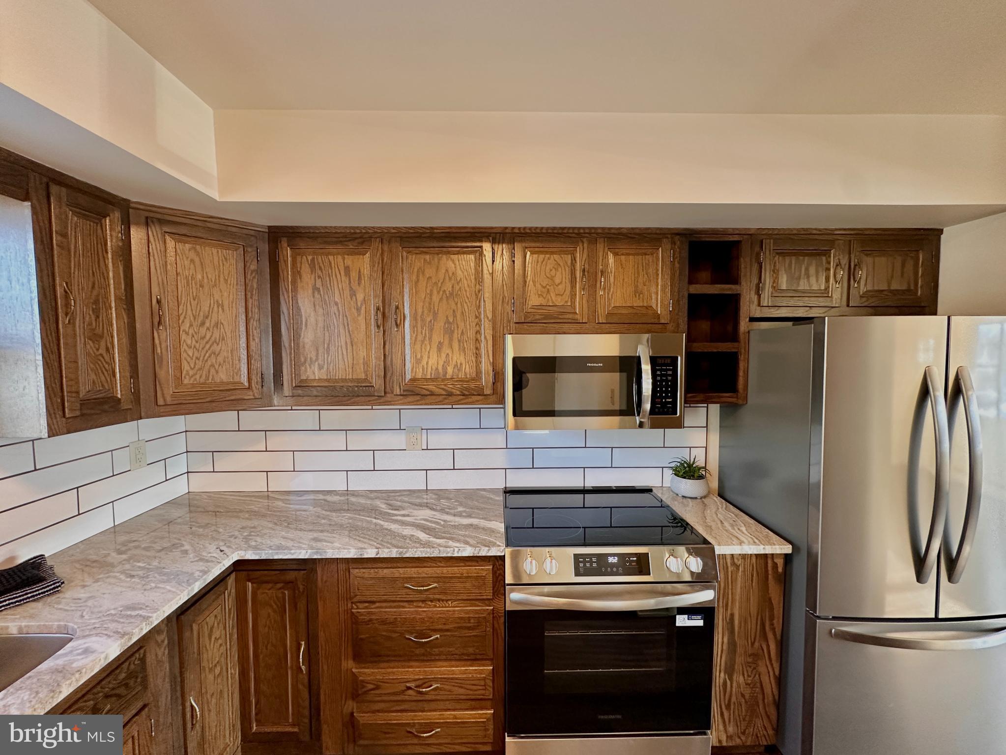 Modern kitchen with warm wooden accents.