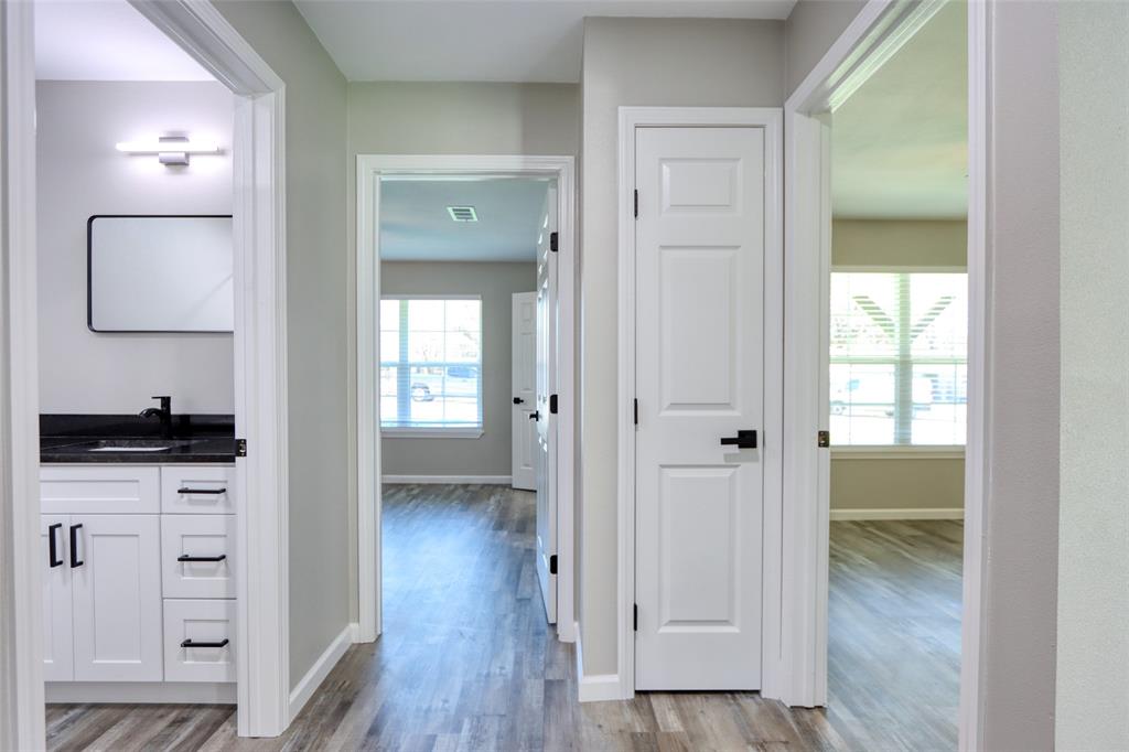 111 Kay Drive Robinson, TX 76706 - Photo 15 of 40 wooden floor with white cabinets