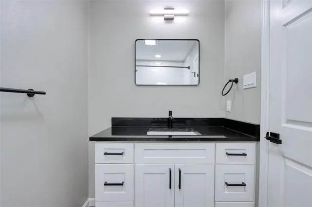 a close view of a sink and mirror