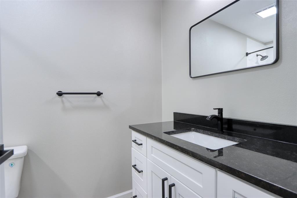 111 Kay Drive Robinson, TX 76706 - Photo 27 of 40 a sink and a mirror