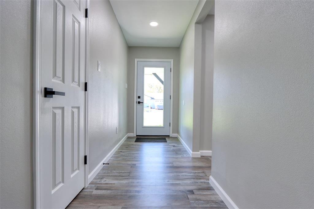 111 Kay Drive Robinson, TX 76706 - Photo 5 of 40 a view of a hallway with wooden floor