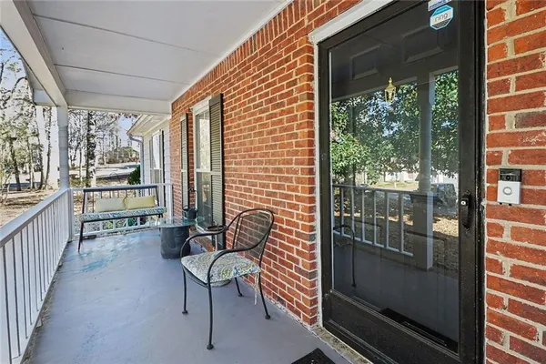 a view of porch with furniture