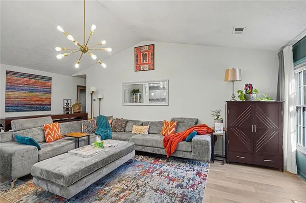 a living room with furniture and a couch