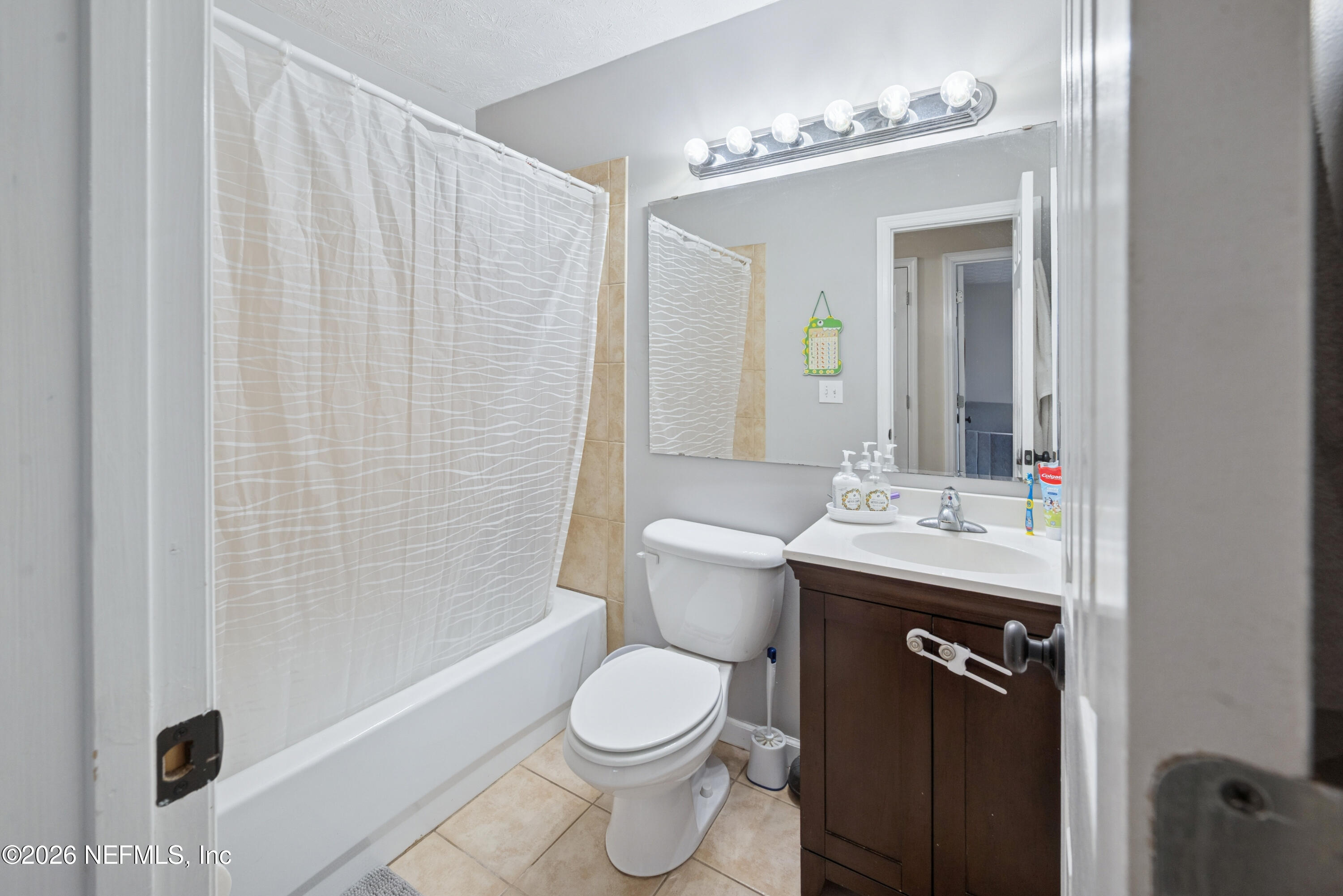 240 Highway 16 Starke, FL 32091 - Photo 22 of 32 a bathroom with a granite countertop sink toilet and shower