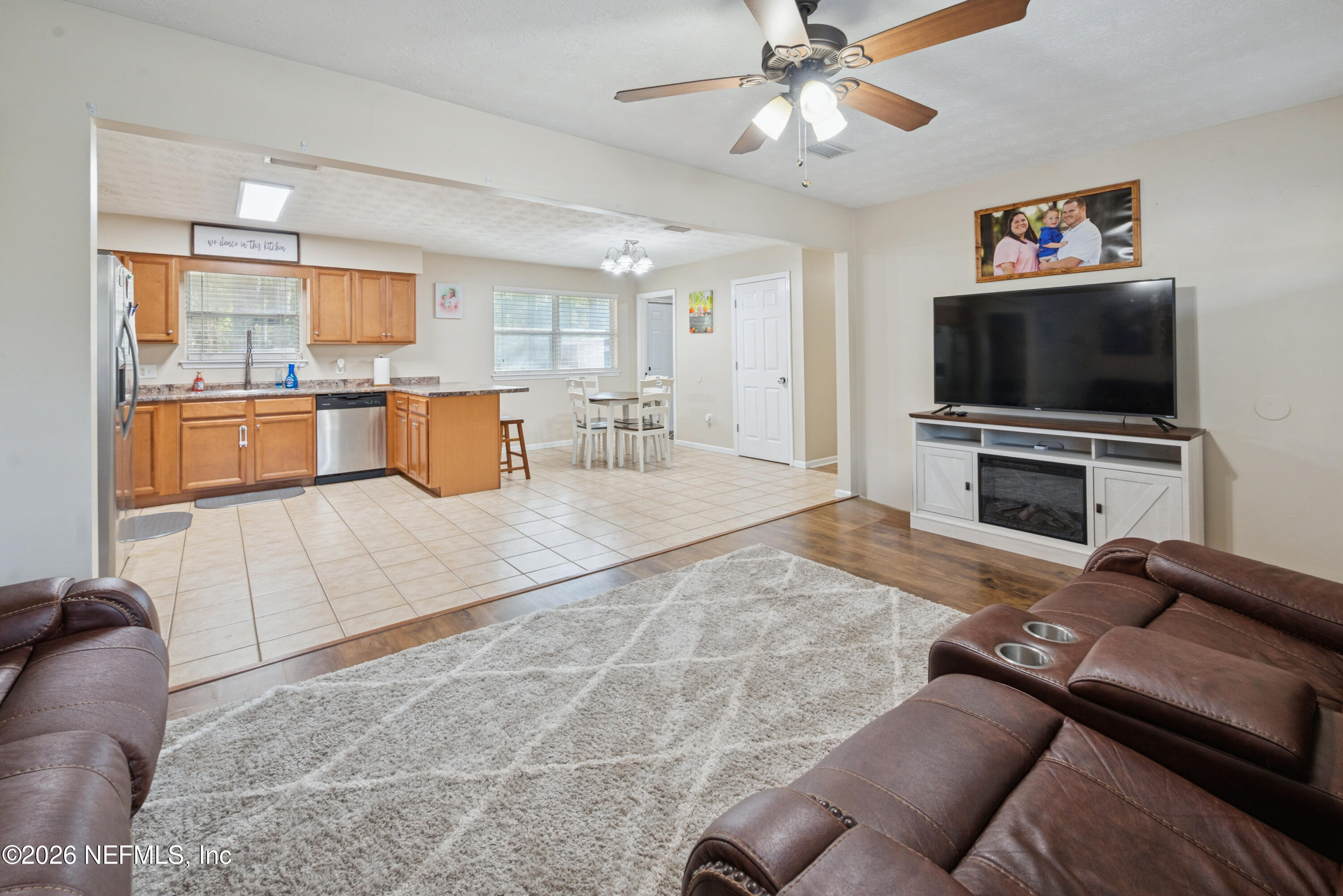 240 Highway 16 Starke, FL 32091 - Photo 5 of 32 a living room with furniture and a flat screen tv