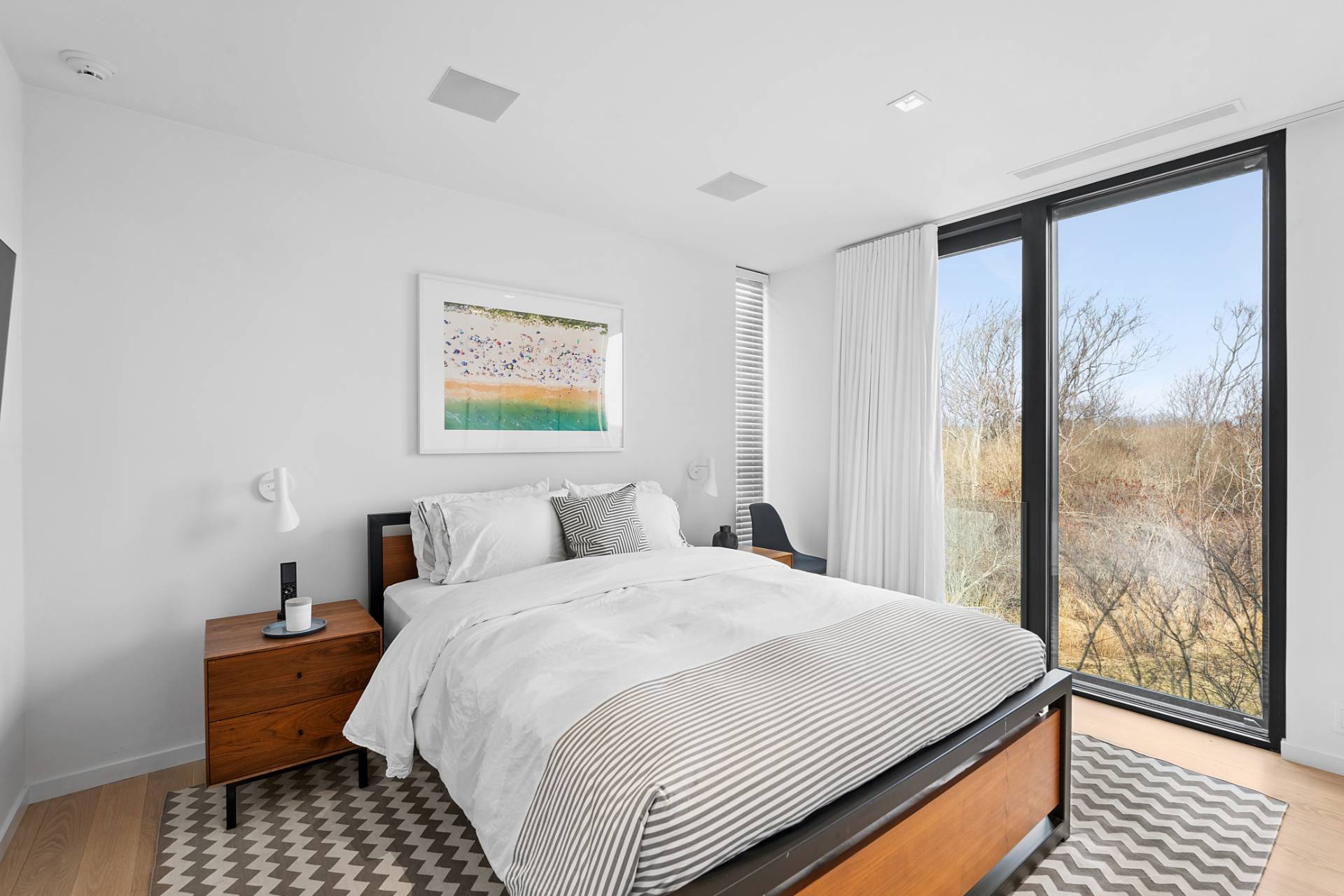 15 Deforest Road Montauk, NY 11954 - Photo 13 of 22 a bedroom with a large bed and a window