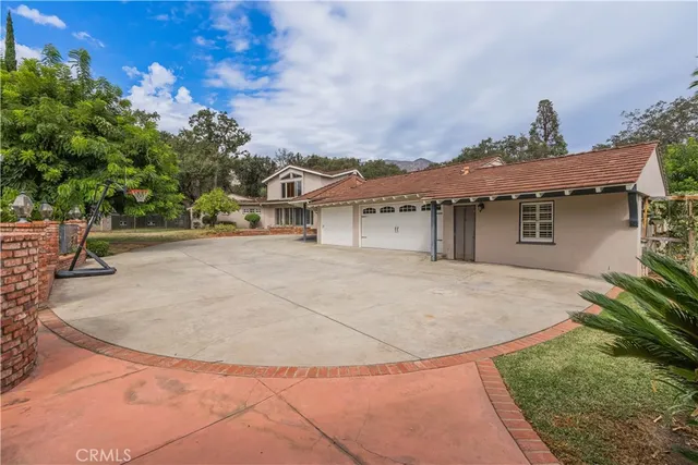 front view of a house with a dry yard
