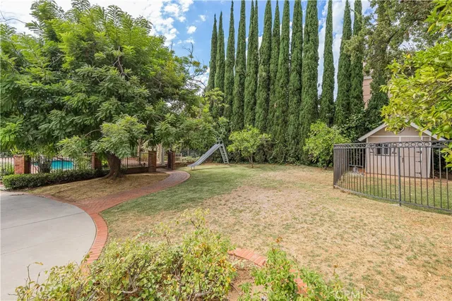 a view of backyard with green space