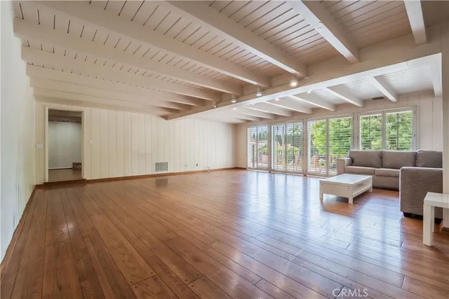 a view of livingroom with furniture and wooden floor