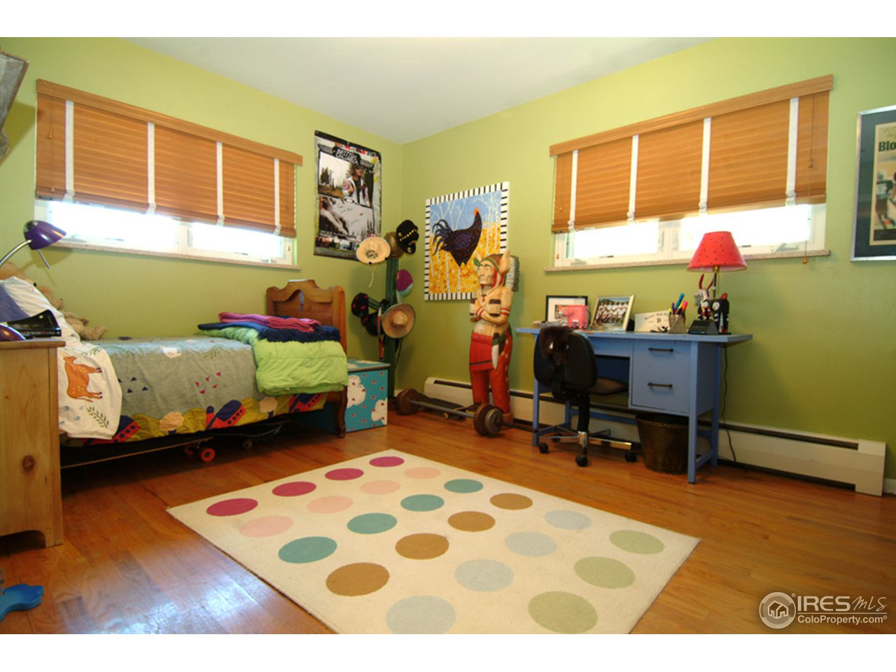 248 Ridge Road Boulder, CO 80303 - Photo 13 of 18 a bedroom with furniture and a window