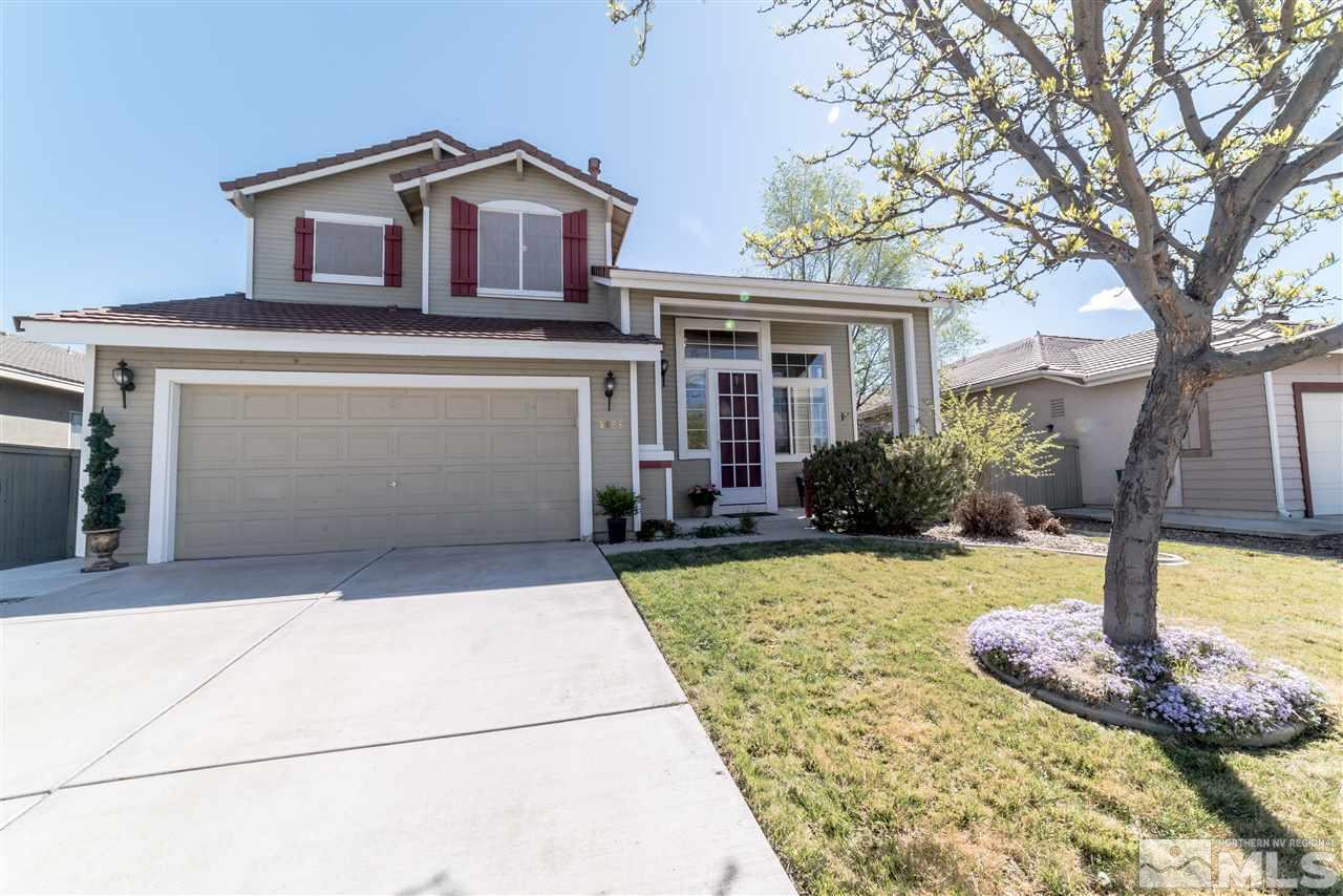 9688 Thunder Mountain Way Reno, NV 89521 - Photo 1 of 1 a front view of a house with garden