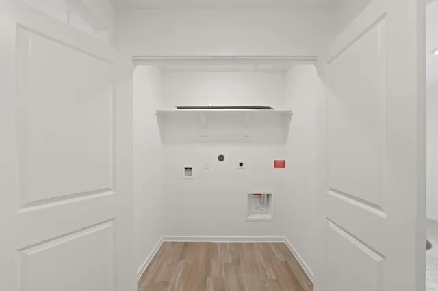 a view of storage and utility room with empty racks