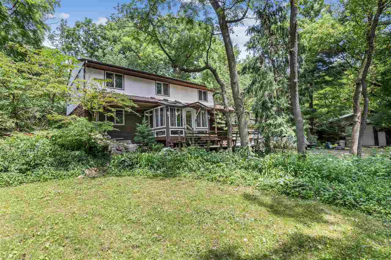 a house view with a garden space