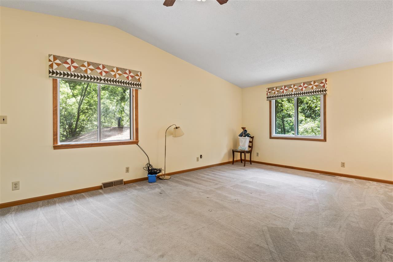 11064 Cemetery Road Capron, IL 61012 - Photo 19 of 40 a view of an empty room with a window