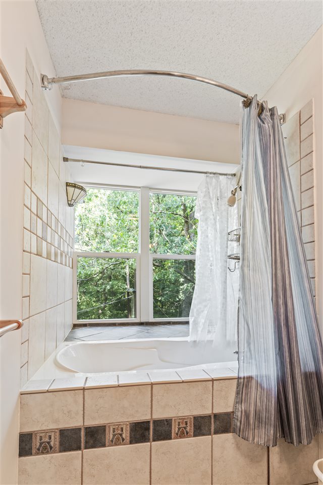 11064 Cemetery Road Capron, IL 61012 - Photo 23 of 40 a view of a bathroom with a window