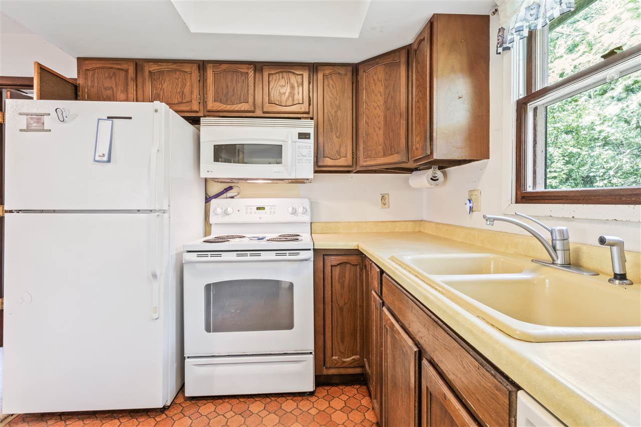 11064 Cemetery Road Capron, IL 61012 - Photo 6 of 40 a utility room with sink washer and dryer