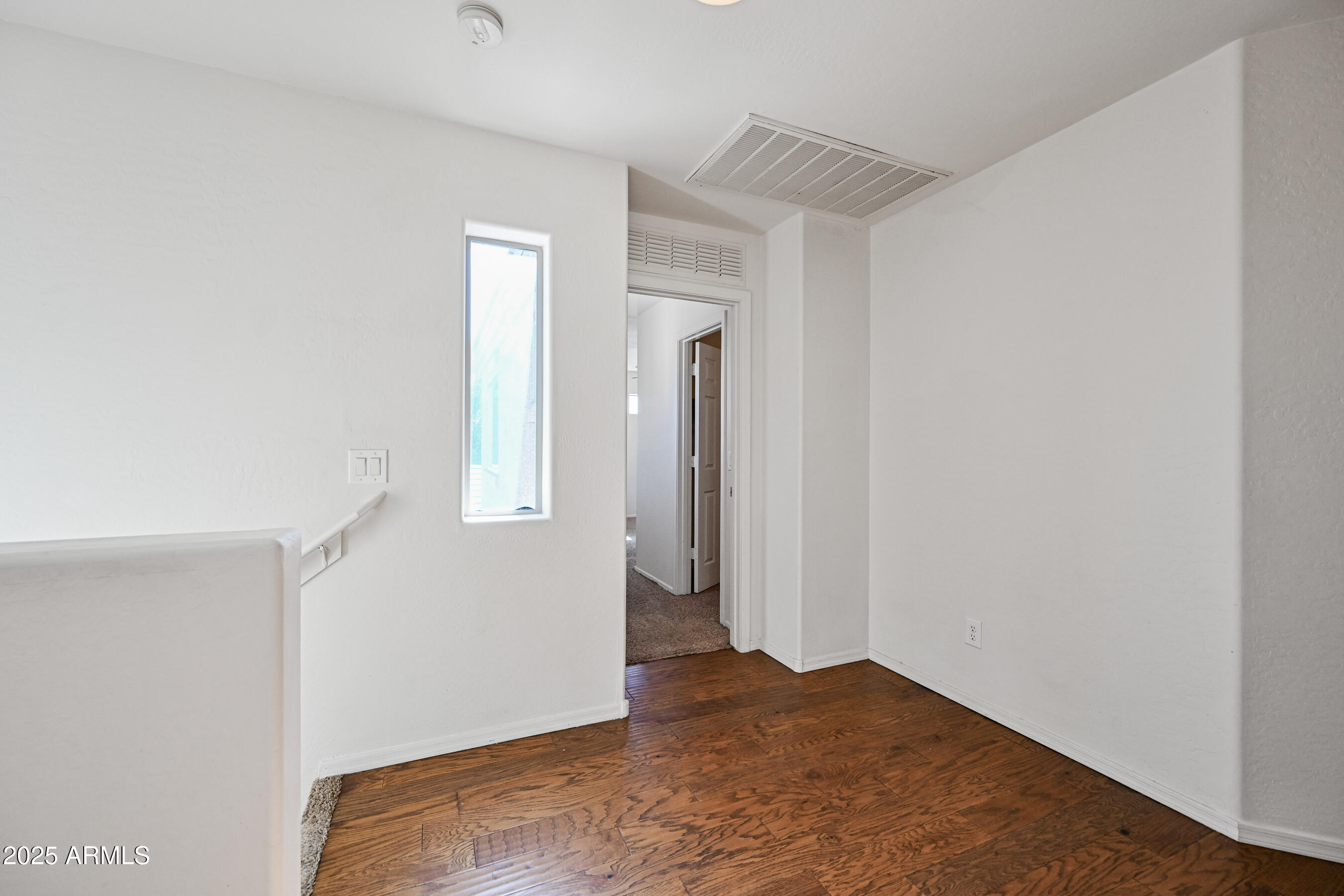 3726 West Pollack Street Phoenix, AZ 85041 - Photo 15 of 27 a view of hallway with window