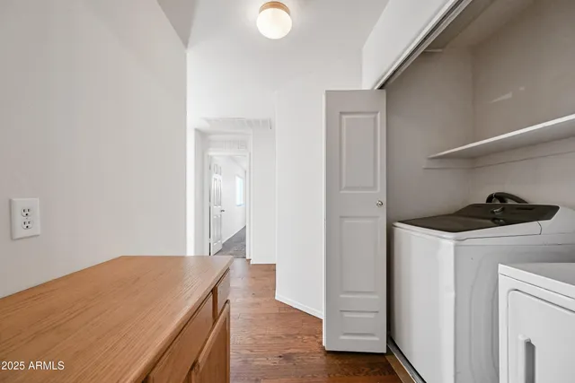 a kitchen with a stove and a refrigerator