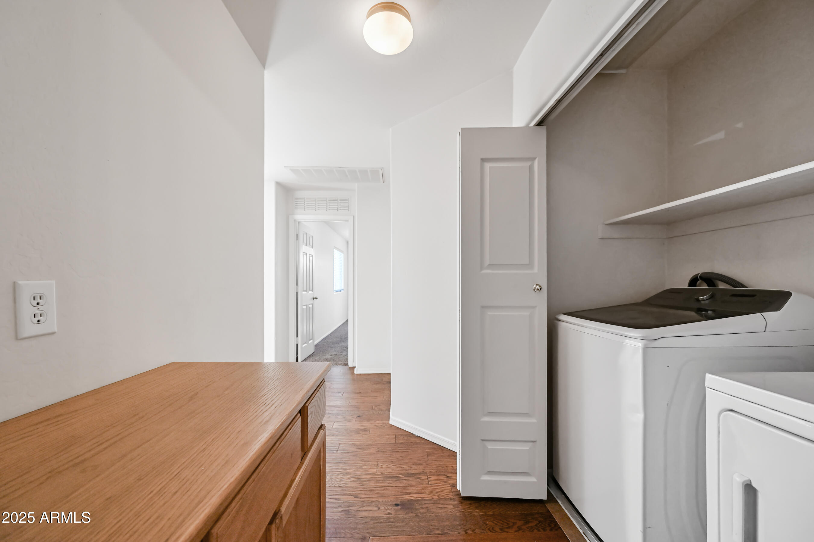 3726 West Pollack Street Phoenix, AZ 85041 - Photo 24 of 27 a kitchen with a stove and a refrigerator