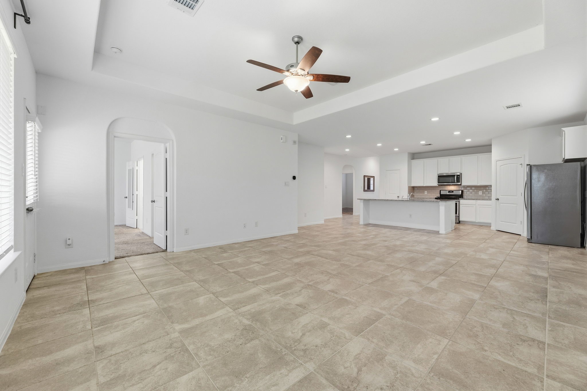 17515 Harbourfront Road Humble, TX 77346 - Photo 9 of 36 Living Room over looking the Kitchen