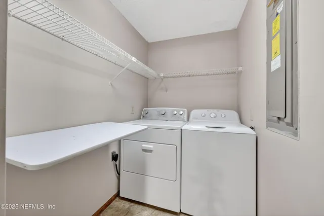a utility room with dryer and washer