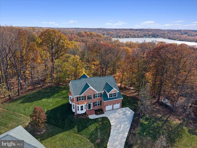 an aerial view of a house with a garden