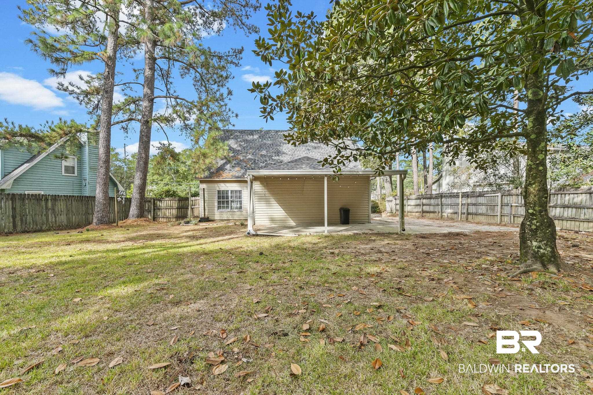 474 Ridgewood Drive Daphne, AL 36526 - Photo 55 of 57 View of yard featuring a patio area
