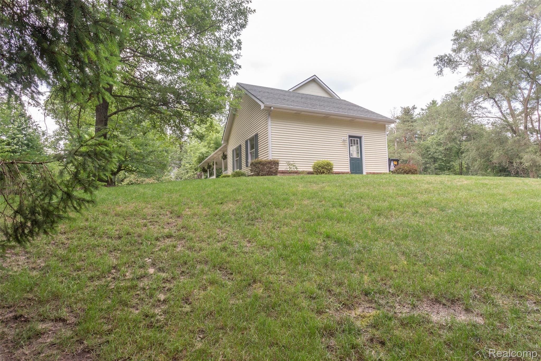 5439 Pleasant Valley Road Brighton, MI 48114 - Photo 3 of 55 Pleasant Valley_5439--Exterior-45.jpg