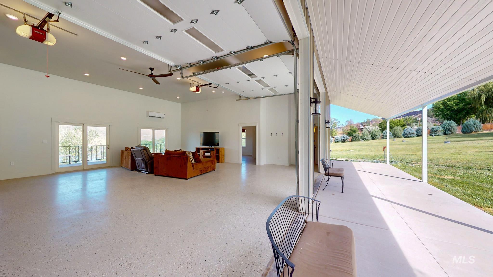863 Pottery Road Bliss, ID 83314 - Photo 26 of 45 Expansive interior with a light-colored, speckled floor and tall ceilings